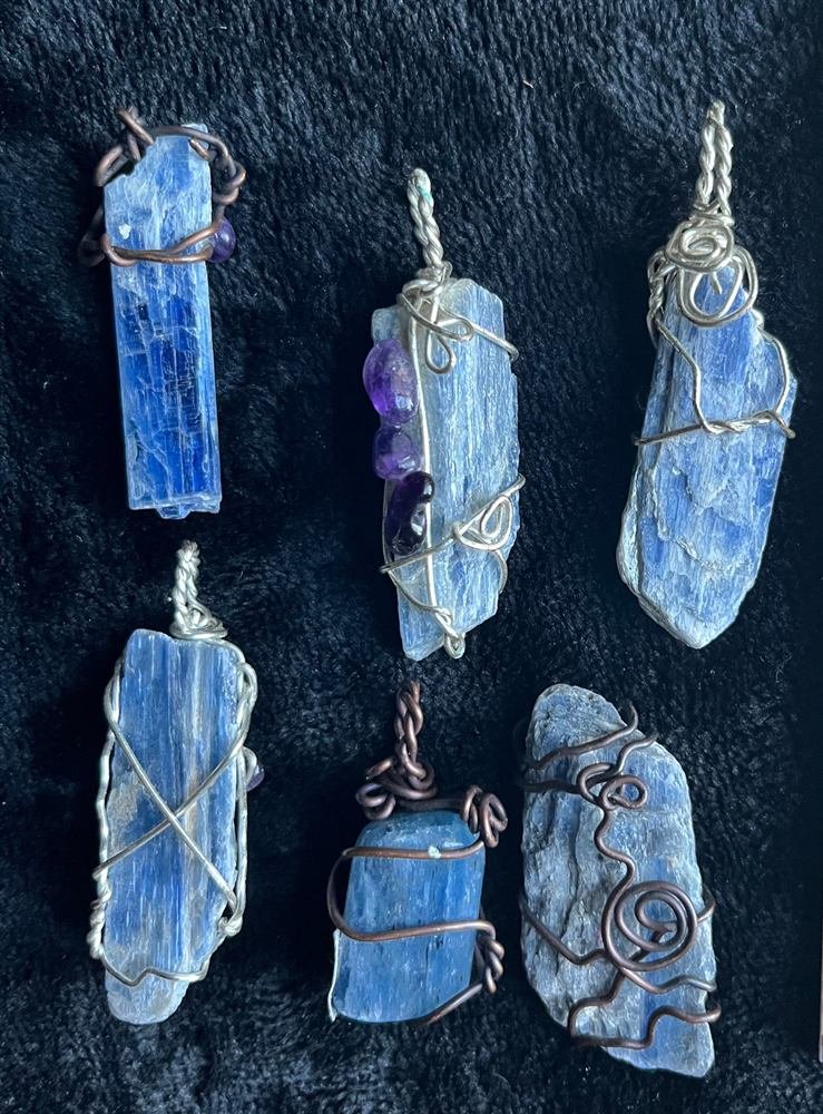 Blue Kyanite Pendants, handmade by Wilhelmina St&ouml;cker