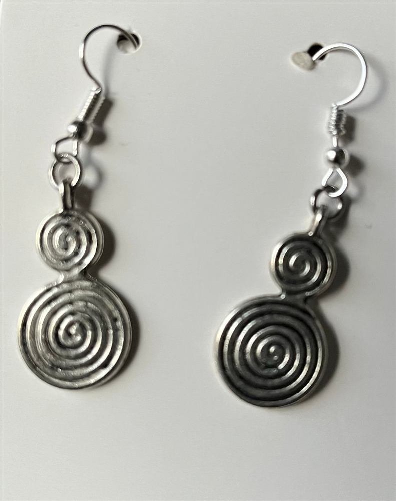 Infinity swirl Earrings & bracelet set, handmade by Wilhelmina St&ouml;cker